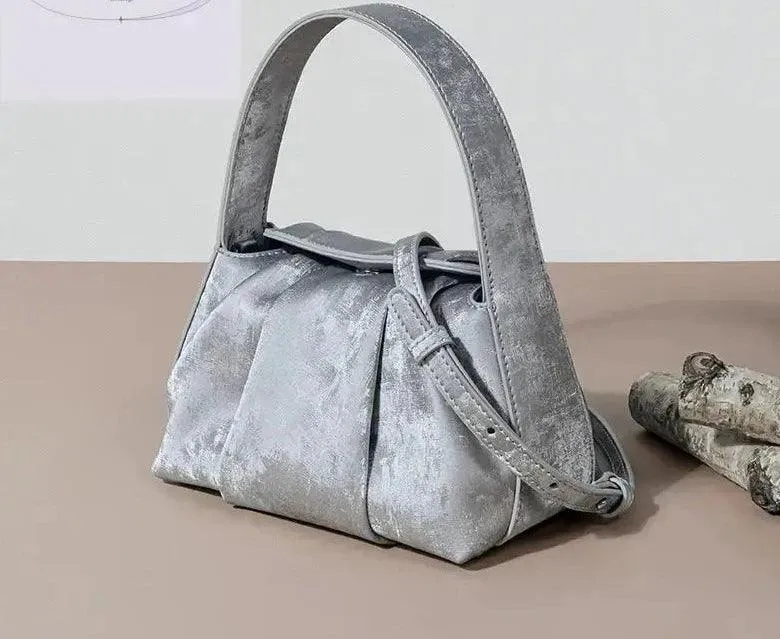 Sustainable Elegance Satin Cowhide Dumpling Handbag