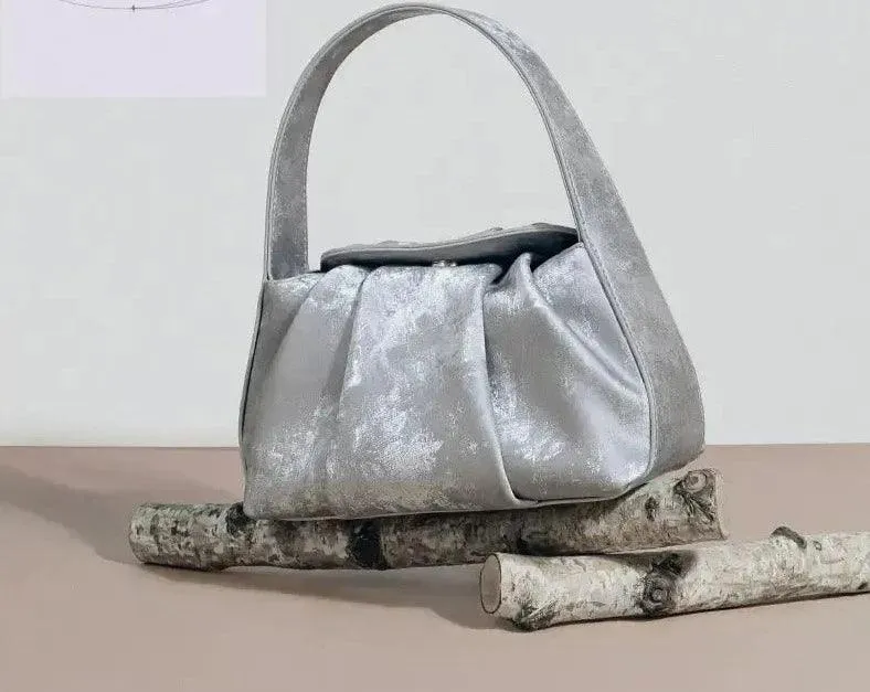 Sustainable Elegance Satin Cowhide Dumpling Handbag